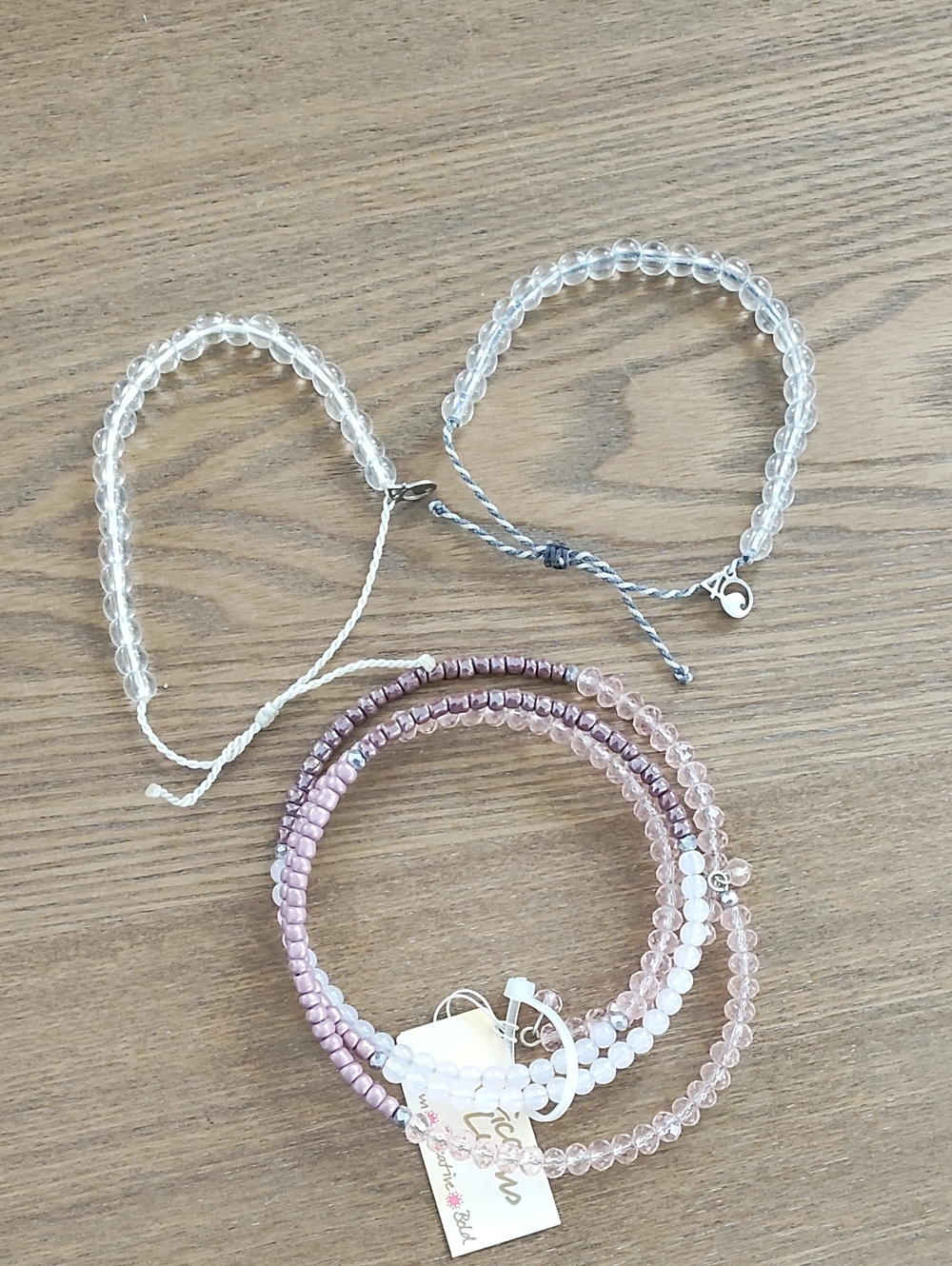 Stackable Pink and Clear Beaded Bracelet  And Two 4 Ocean Bracelets.
